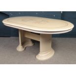 An Italian style dining table with twin pedestal support. (77cm x 175cm x 105cm).