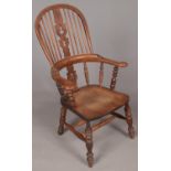 A 19th Century ash/elm Windsor armchair.