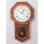 A mahogany cased octagonal drop dial wall clock.