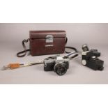 A Olympus OM 10 SLR camera. To include Olympus camera case, Cobra D400 & Chinon Pro 1090C flashes.