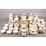 A very large quantity of Royal Albert old country roses. Including teapot, coffee pot, vases, cake