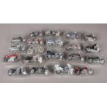 A box of twenty three die-cast motorcycles. To include Suzuki, Harley Davidson, and BMW etc.