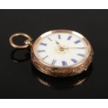 A 9ct gold fob watch. With white enamel dial and Roman numeral markers. Case stamped Cuivre.