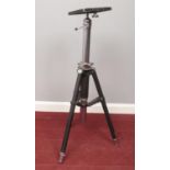 A Metal Kodak Compact Tripod Stand. Adjustable height.