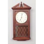 A Staiger wooden wall clock with Westminster chime. H: 55cm, W: 25cm.