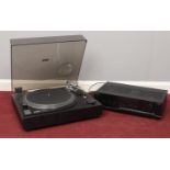 A Sherwood Stereo Receiver RX-1010 & Stereo turntable Model No. PM-8550.