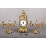 Italian cartouche shaped gilt metal clock garniture. The white enamel dial signed 'Imperial' with
