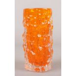A Whitefriars bark effect tangerine glass cylinder vase. 14.5cm.