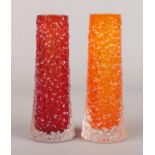 Two Whitefriars style textured glass vases. Ruby red and tangerine. 15cm.