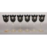 Six bohemian black/clear crystal wine glasses.