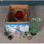 A box of mixed glassware. Includes Mdina, paperweights, large vase etc.