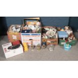 Four boxes of miscellaneous. Including boxed portable record player, glassware, vogue calendar,