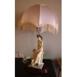 A large composite figural table lamp. (76cm)