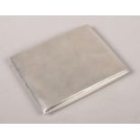 A silver cigarette case. Assayed Sheffield 1930 by Walker & Hall.