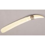 A Victorian ivory page turner with silver collar. Assayed Birmingham 1898.