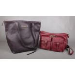 Two leather handbags by 'Pure Luxuries' - London.