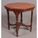 An Edwardian hardwood octagonal window table with small under tier.