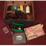 A box of collectables. Includes pipes, dressing table brush set, viewer and slides, souvenir bible