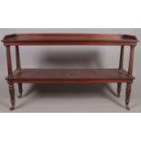 A Georgian mahogany two tier buffet side table. Height 104cm Width 173cm Depth 53cm. General age