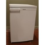 A Miele under counter refrigerator.