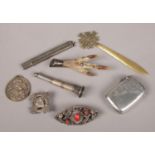 A group of collectables. Includes silver vesta case, pencil and measure, cigar piercer etc.