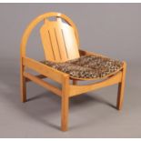 A beechwood Baumann style chair.