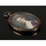 A fine quality 18th century English George II portrait miniature. 4cm x 3cm.