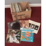 A box of LP records. Including Elton John, Barbara Streisand, Neil Sedaka, etc.