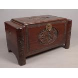 A carved hardwood trunk with camphor wood lining and oriental decoration. Height 57cm Width 103cm