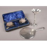 A collection of silver. Includes cased part cruet set assayed Sheffield 1919, specimen vase and a