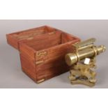 Brass Theodolite stamped Askania Werke, Berlin in brass bound teak case.