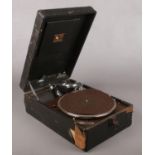A cased vintage wind up gramophone.