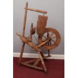 A vintage spinning wheel.