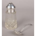 A silver sugar sifter spoon along with a white metal & glass sugar sifter. Spoon Assayed