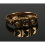 An antique 18ct gold diamond and sapphire ring. Size L. 2.7g.