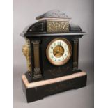 A large decorative Marble & Slate mantle clock. Comprising of a a white enamel dial with Arabic