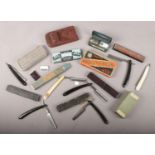 A box of collectable shaving items. Includes cut throat razors, blades, Rolls Razor etc.