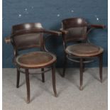 Two Mahogany Bentwood Armchairs with Leather Studded Seat and Back. Condition Fair, small tear to