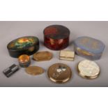 A small group of collectables. Includes pill boxes, compacts, lacquered boxes etc.
