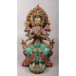 A bronze devotional figure with jewelled decoration. 28.5cm.