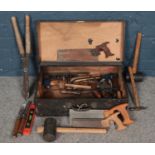 A Large Lockable Tool Chest, complete with Tools. Includes various sized Saws, Mallets and Chisels.
