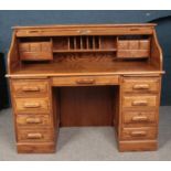 A modern oak roll top desk.