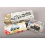 A group of boxed die cast vehicles. Corgi Classics 55101 United States Armed Forces, Corgi