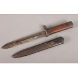 A WWI short bayonet with metal scabbard.