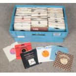 A box of single records. Mainly 1970s and 1980s disco examples.