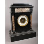 A large slate and marble mantel clock of architectural form. Comprising of a AD. Mougin movement,