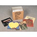 A box of LP records. Includes Bob Dylan, Joe Cocker, Rod Stewart etc.