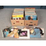 Two boxes of LP records. Includes Joe Cocker, The Eagles, Adam & The Ants etc.