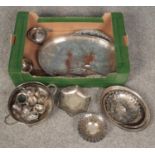 A box of silver plate. Includes Reed & Barton dish, cruets etc.
