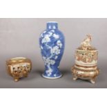 A group of Oriental ceramics. To include two Japanese Satsuma pieces decorated with male and